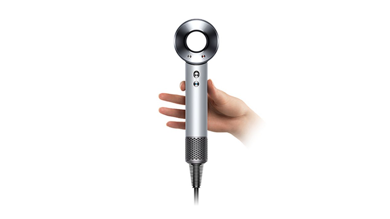 Dyson supersonic hair dryer light in hand